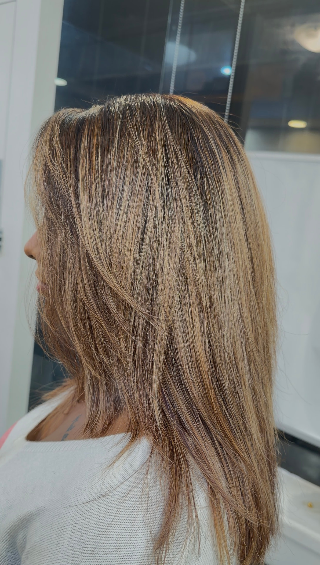 Sleek layered bronde with fine dimensional highlights